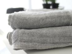 Activated charcoal fibers used in towels and dish cloths.