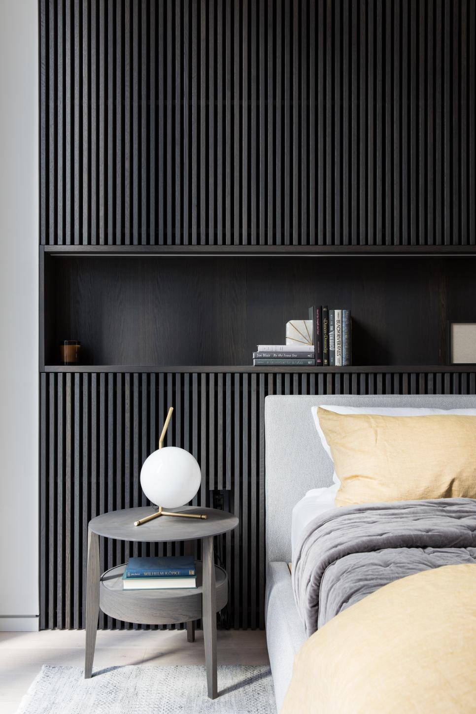 Bedroom Wall Complete With Built-In Shelf modern master bedroom with black accent wall