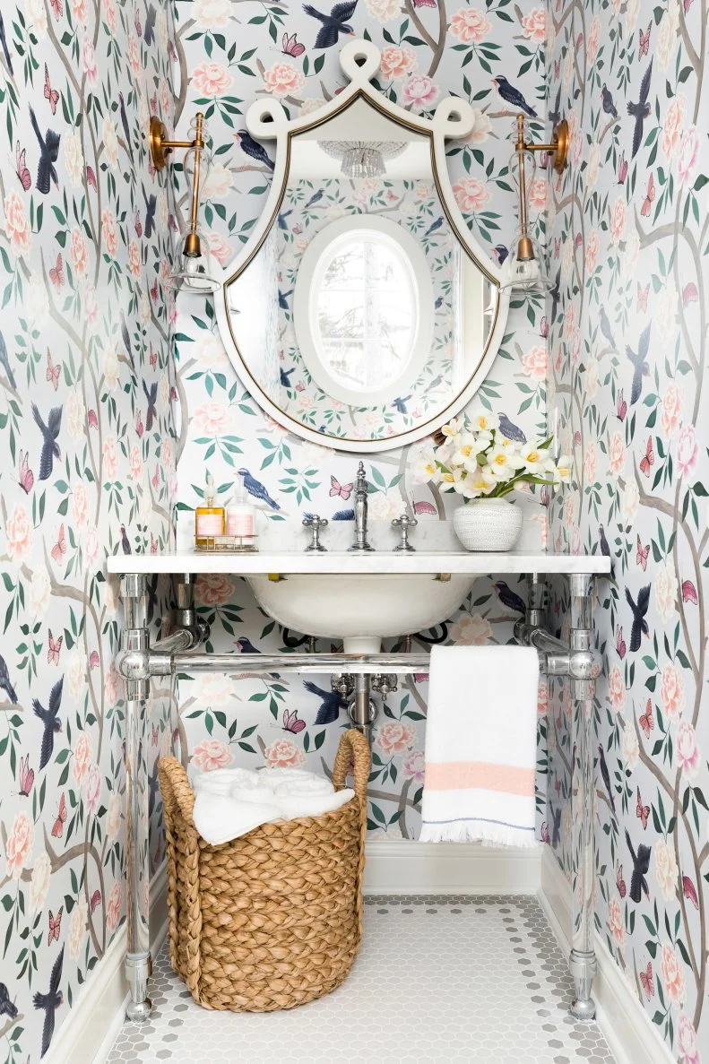 transitional powder room with floral wallpaper