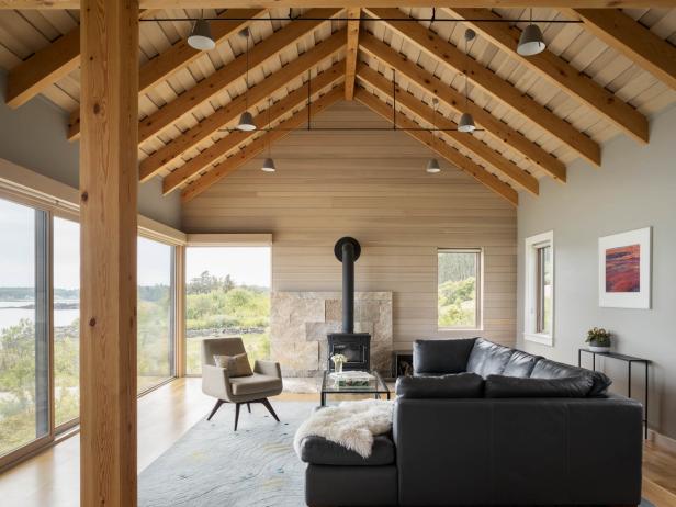 Modern Cottage Living Room With Exposed Beams And Leather Sectional