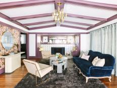 eclectic living room with purple ceiling beams