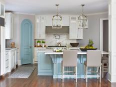 Open Plan Kitchen With Arched Door