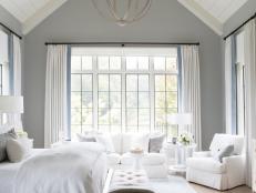 Traditional Master Bedroom With White Upholstered Furnishings