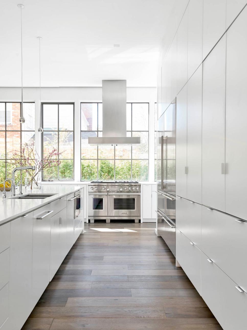 Modern Kitchen With Custom Cabinets, Stainless Appliances modern white kitchen with stainless appliances