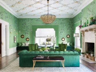 Green And Gold Living Room With Antique Furnishings And Chandelier