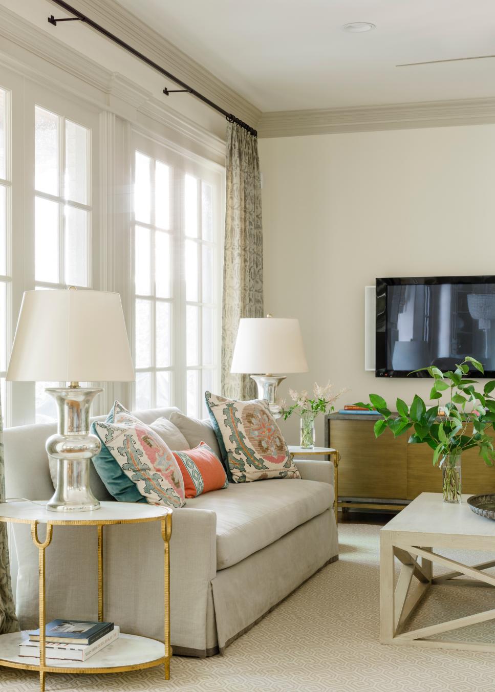Traditional Living Room With White And Metallic Accents Traditional Living Room With White Sofa And Gold And Silver Accents