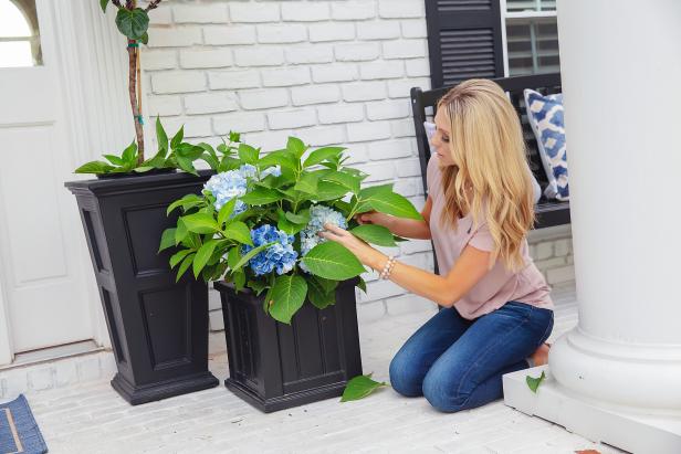Jenny Reimold shares how she uses a mix of faux and real flowers in her front porch planters to achieve full, colorful containers year-round.