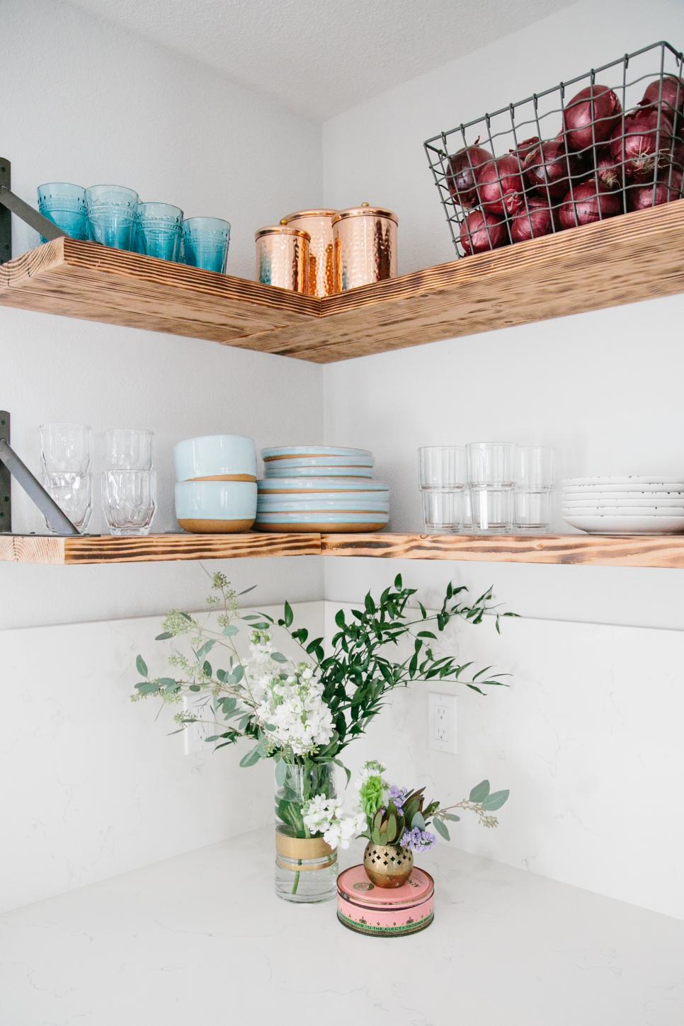Modern White Kitchen with Brown Wooden Open Shelving White Kitchen with Brown Wooden Open Shelving, Multicolored Dishware