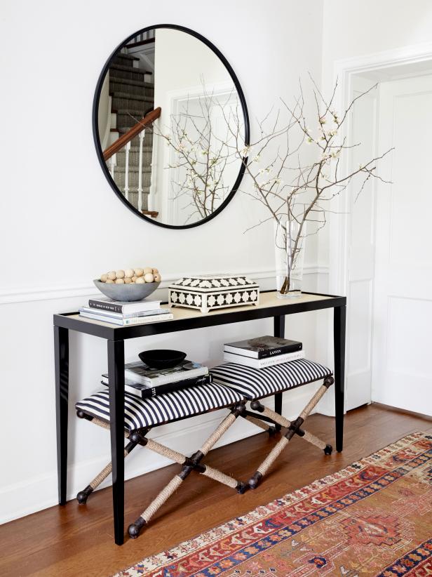 HGTV magazine's Black and white decorated entryway.