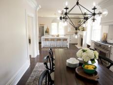 White Victorian Kitchen and Dining Room with Hardwood Brown Floors