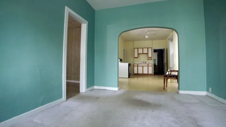 The interior of the Lincoln Park Fourplex renovated on Windy City Rehab was dated and had been abandoned for many years.