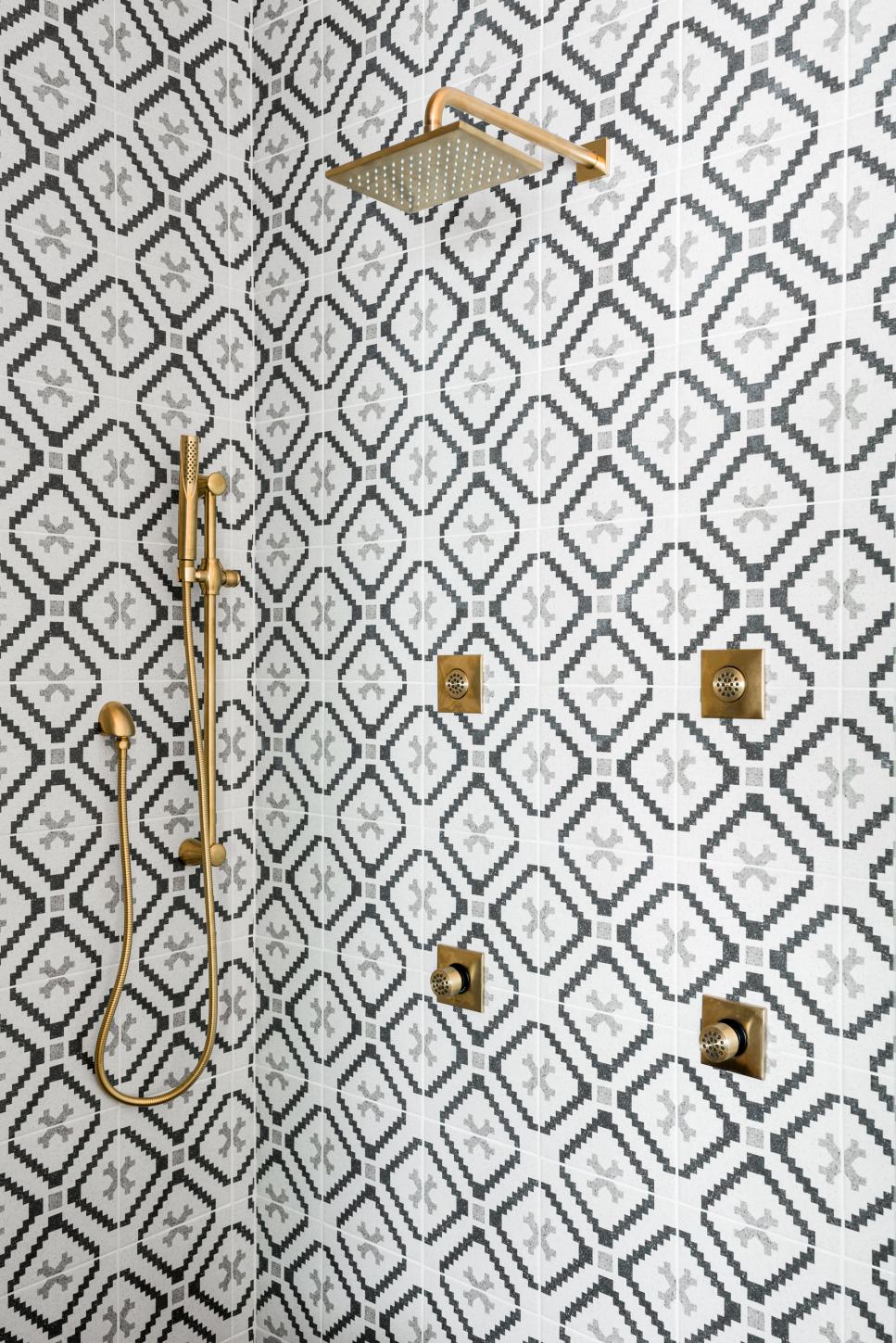 Sculptural Shower Accents Multiple Showerheads in Geometric-Tiled Shower