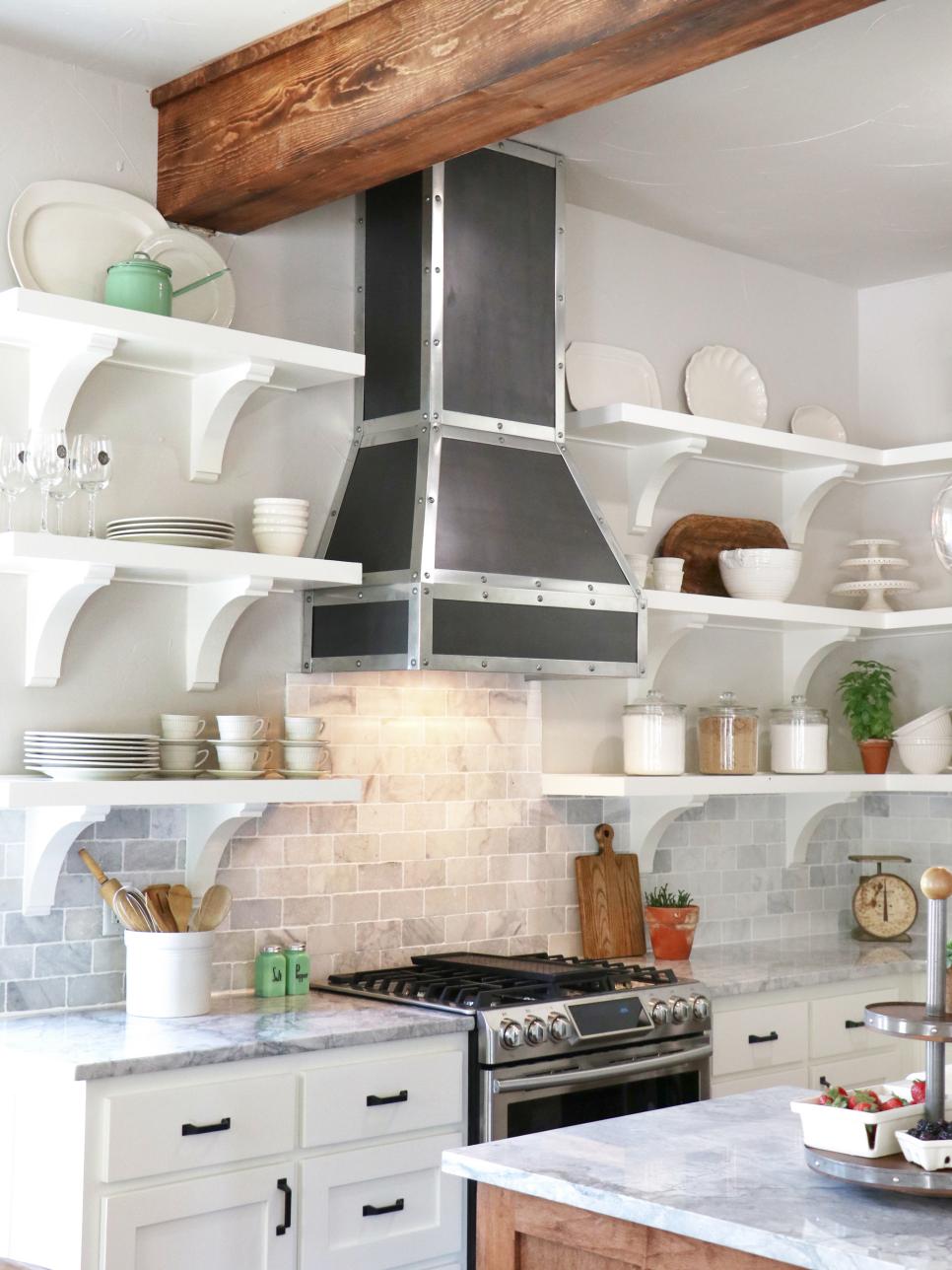 Black Range Hood Adds Contrast to White Transitional Kitchen Black Range Hood With Steel Trim in White Kitchen