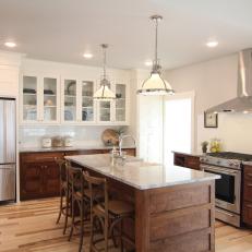 Eat-In Transitional Kitchen Has Dark Cabinets and Granite Countertops