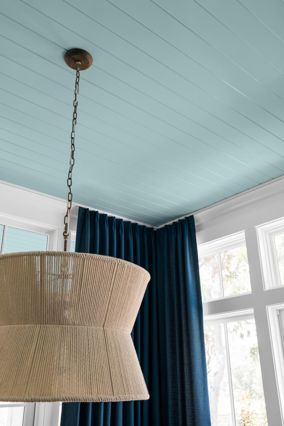 Touch of Color Blue-Painted Ceiling With Hourglass-Shaped Pendant Light
