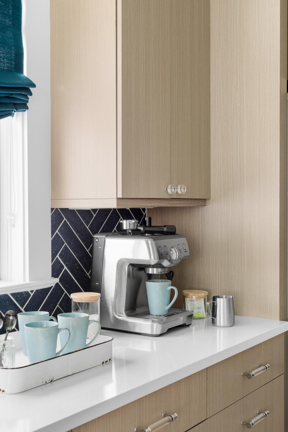 Brew Up a Cup Stainless Steel Espresso Machine With Blue Mug on Kitchen Counter