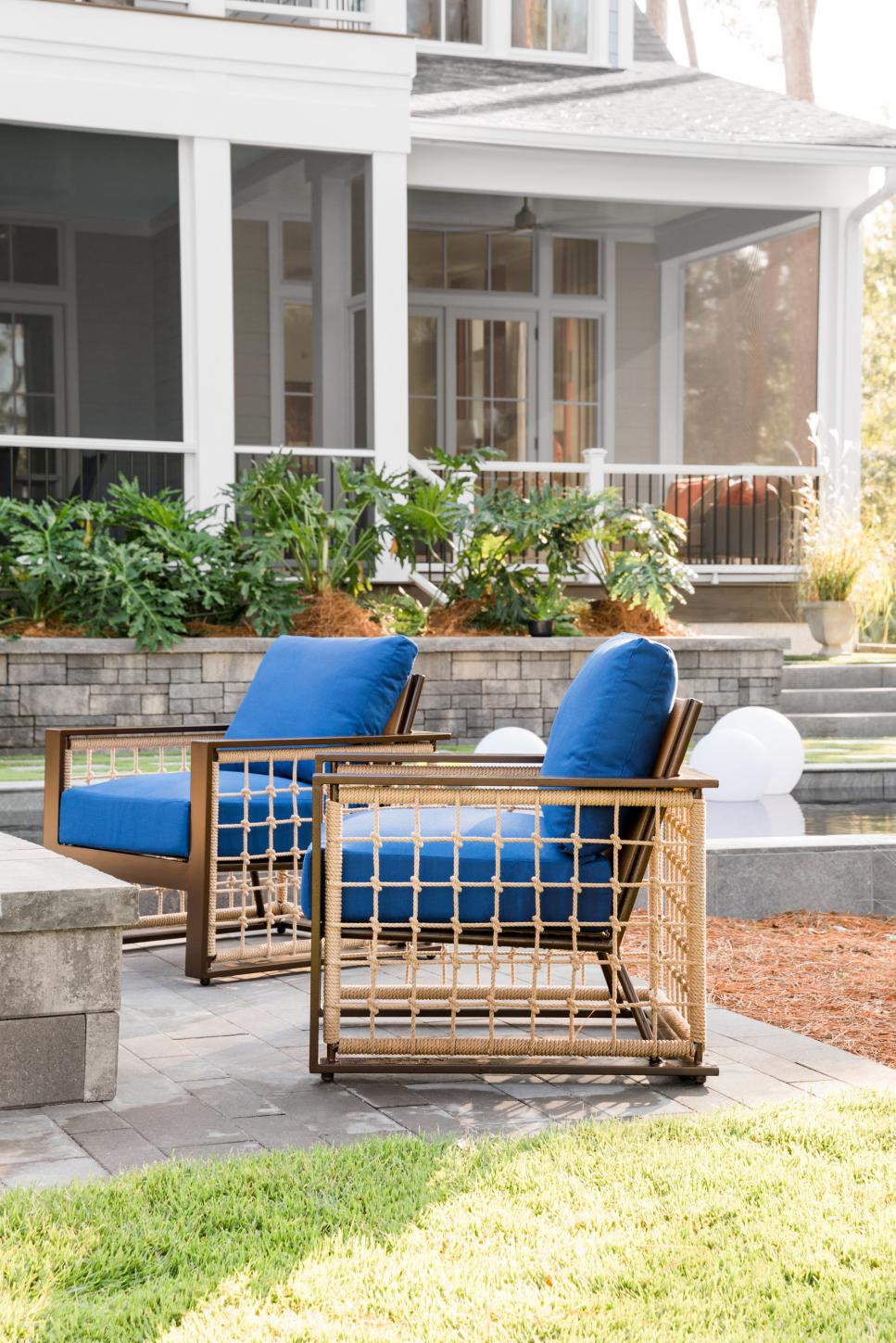 Simply Square Pair of Blue Upholstered Armchairs With Geometric Frames on Patio