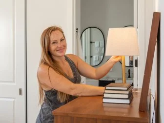 HGTV star Mina Starsiak puts her finishing touch in one of the bedrooms of the house that she must “rock” to the highest increase in market value through her renovation and design, as seen on Rock the Block. (Working)