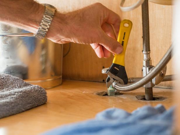 First, use an adjustable wrench to detach each of the water supply lines near the shut-off valves. It’s much easier to detach water supply lines near the shut-off valves and replace them than to try to keep them and disconnect them near the faucet assembly.