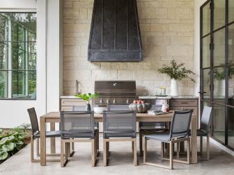 Outdoor Kitchen With Dining Table And Chairs For Eight Guests