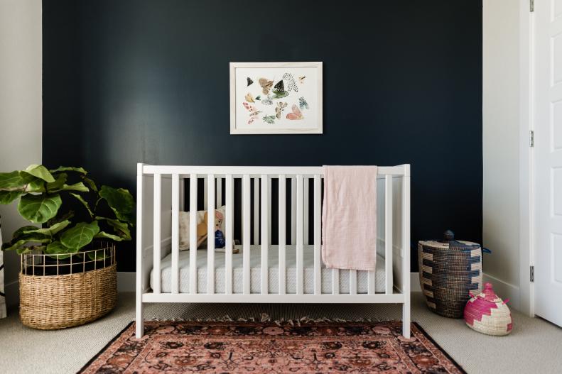 Contemporary Nursery Features Black Accent Wall