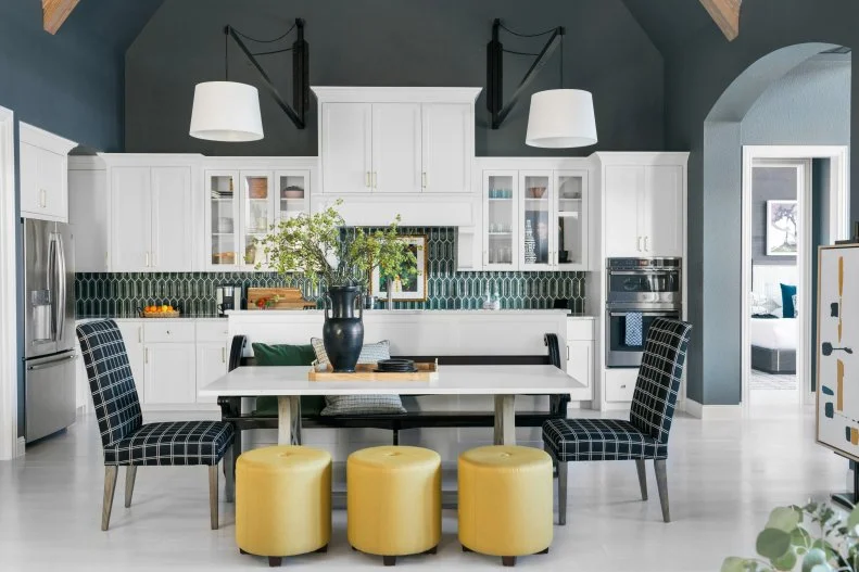 Gray Open Plan Kitchen and Yellow Stools