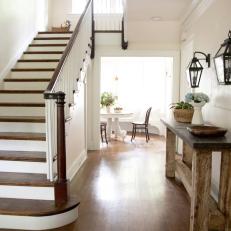 Contemporary White Foyer with Brown and White Wooden Staircase