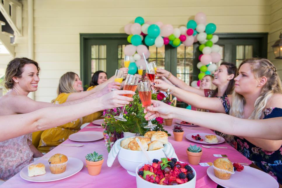 Happy Guests Cheers at a Backyard Bridal Party Backyard Bridal Party With Happy Guests and Elegant Decor