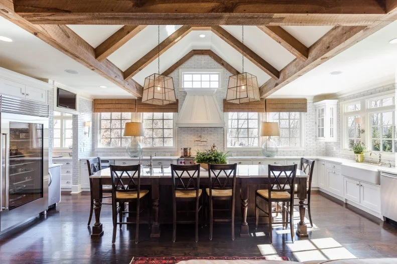 White Kitchen With Subway Tile, Dark Wood Ceiling Beams