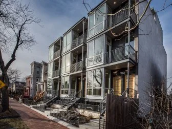 modern condo with iron railings