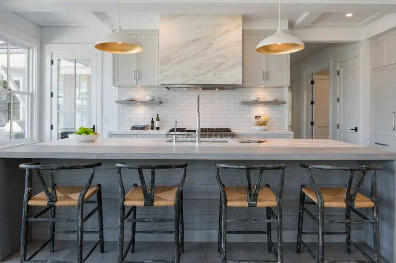 Marble Range Hood in Modern Kitchen with Four-top Island