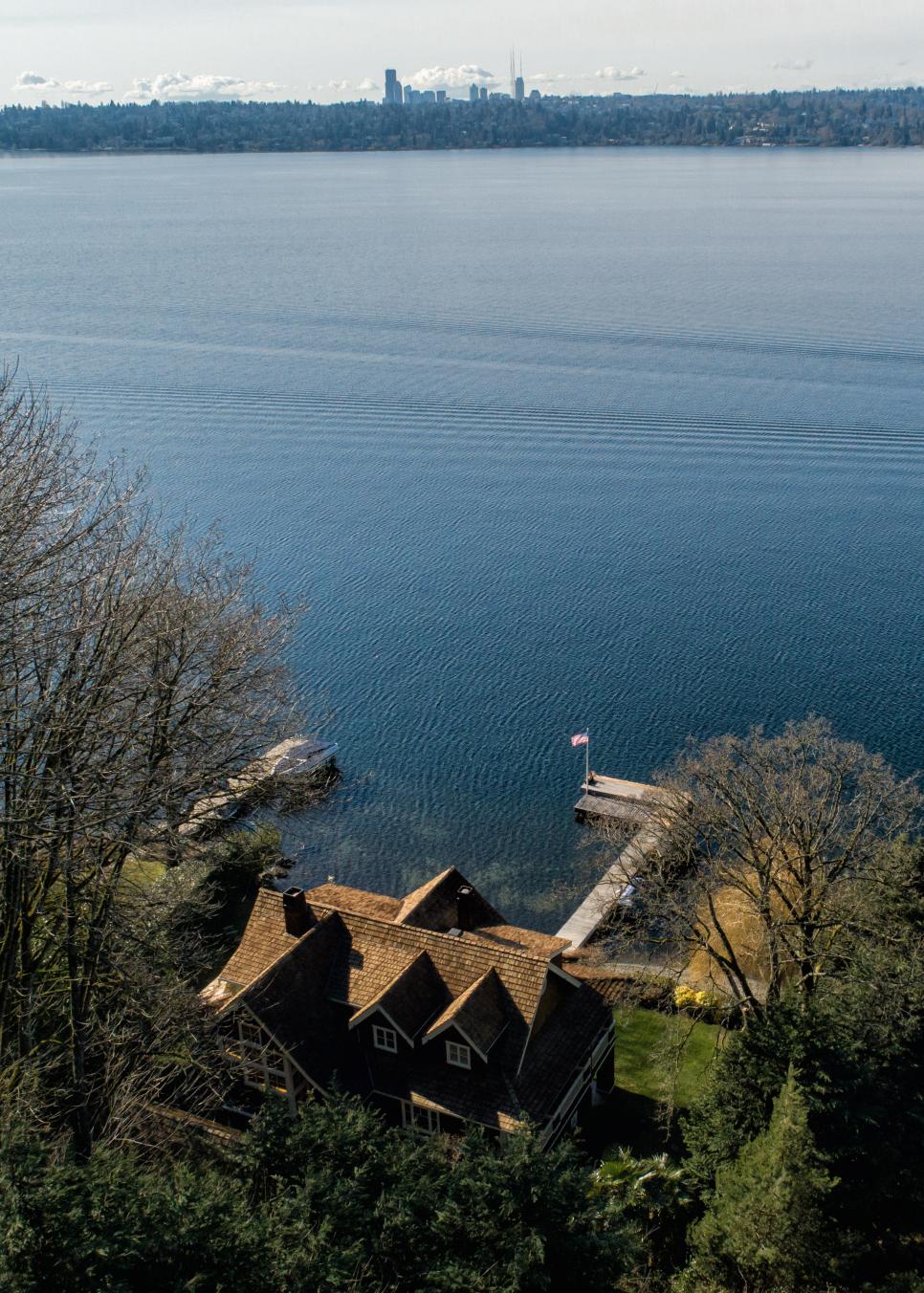Aerial Photo Of Craftsman Style Home With Skyline View Aerial View Of Entire Home Situation On The Water's Edge