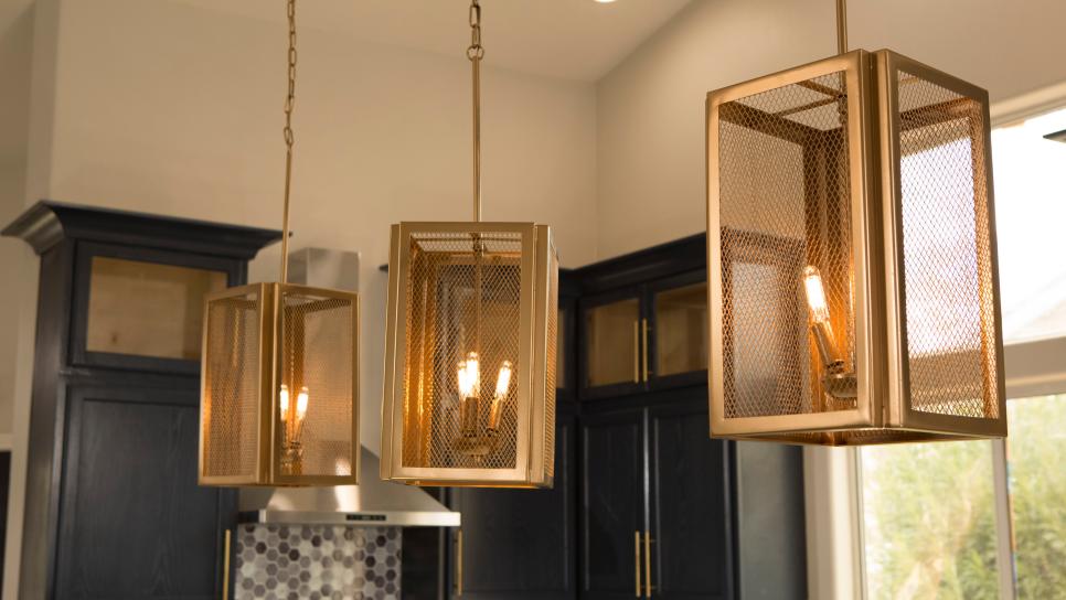 Modern Neutral Kitchen with Golde Pendant Lights Three Gold Pendant Lights