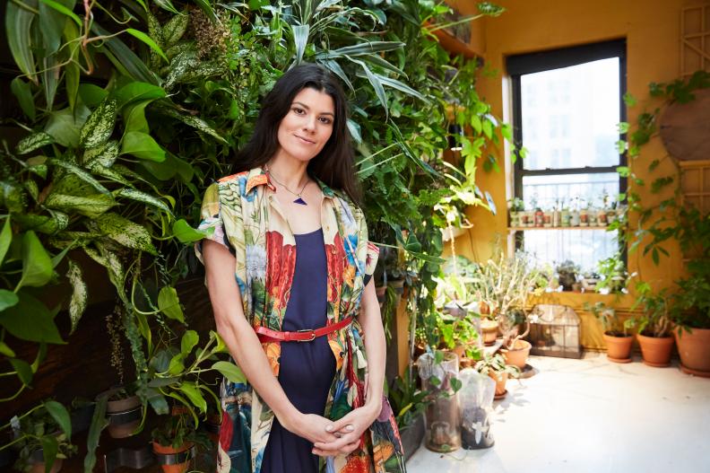 Summer Rayne Stands in Front of Her Living Plant Wall in Her NYC Home
