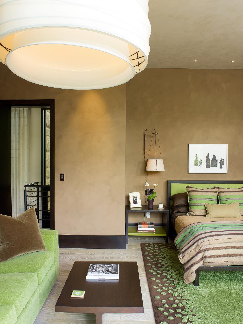 Green Accents Freshen Up Neutral Contemporary Bedroom Sitting Area With Lime-Green Sofa in Neutral Contemporary Bedroom