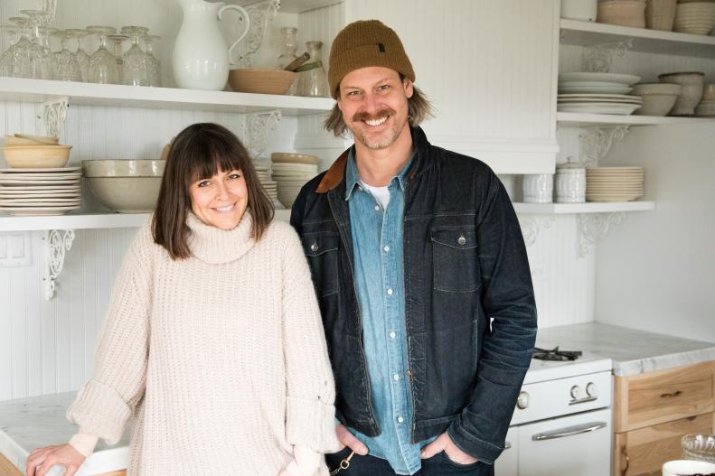 Steve and Leanne Ford in the new kitchen of the modern farmhouse they renovated together as seen on Restored by the Fords