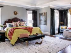 Gray Eclectic Master Bedroom With Orange Throw