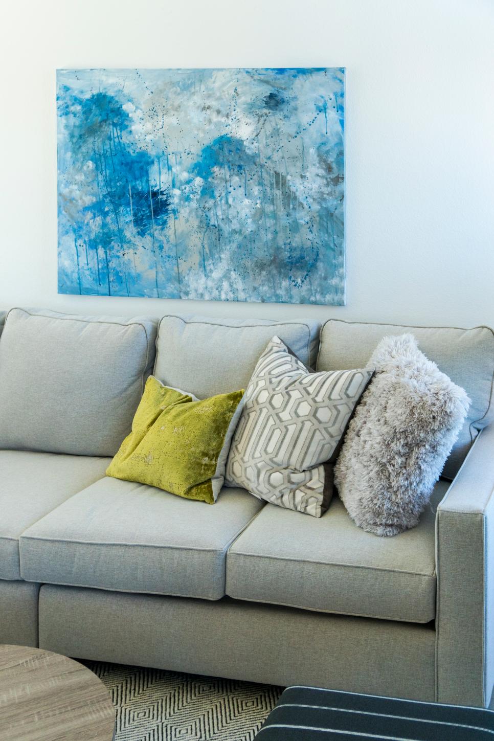 Contemporary Neutral Living Room with Gray Sofa and Green Pillow Neutral Living Room with Gray Sofa and Green Pillow, Blue Painting