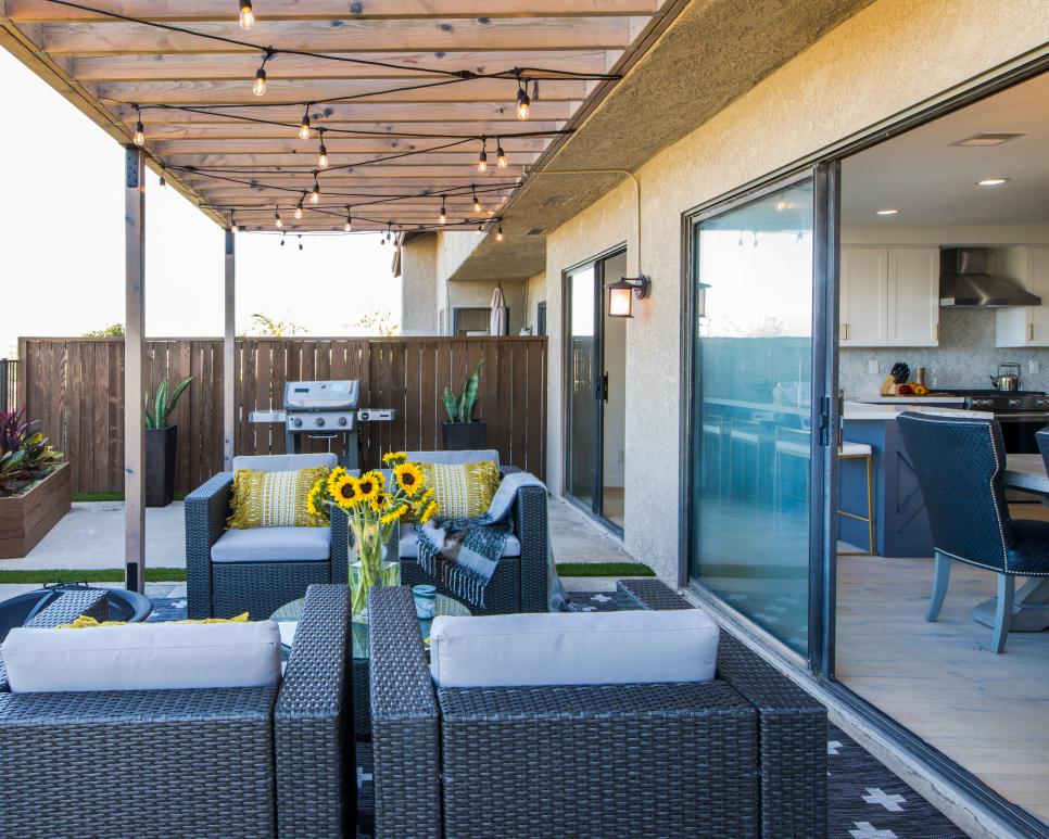 Contemporary Neutral Patio with Black Wicker Chairs Neutral Patio with Black Wicker Chairs, Brown Pergola