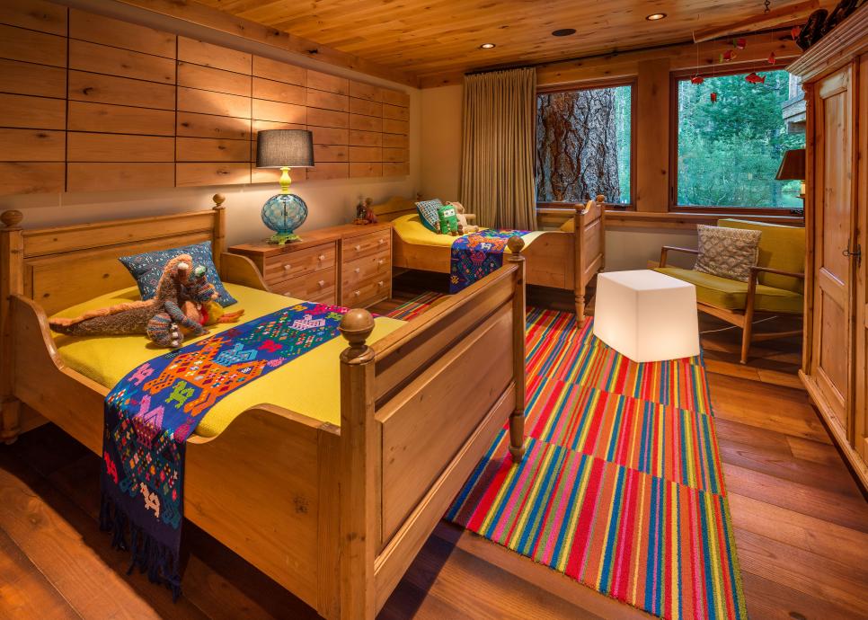 Rustic Bedroom With Striped Rug Rustic Bedroom With Yellow Beds