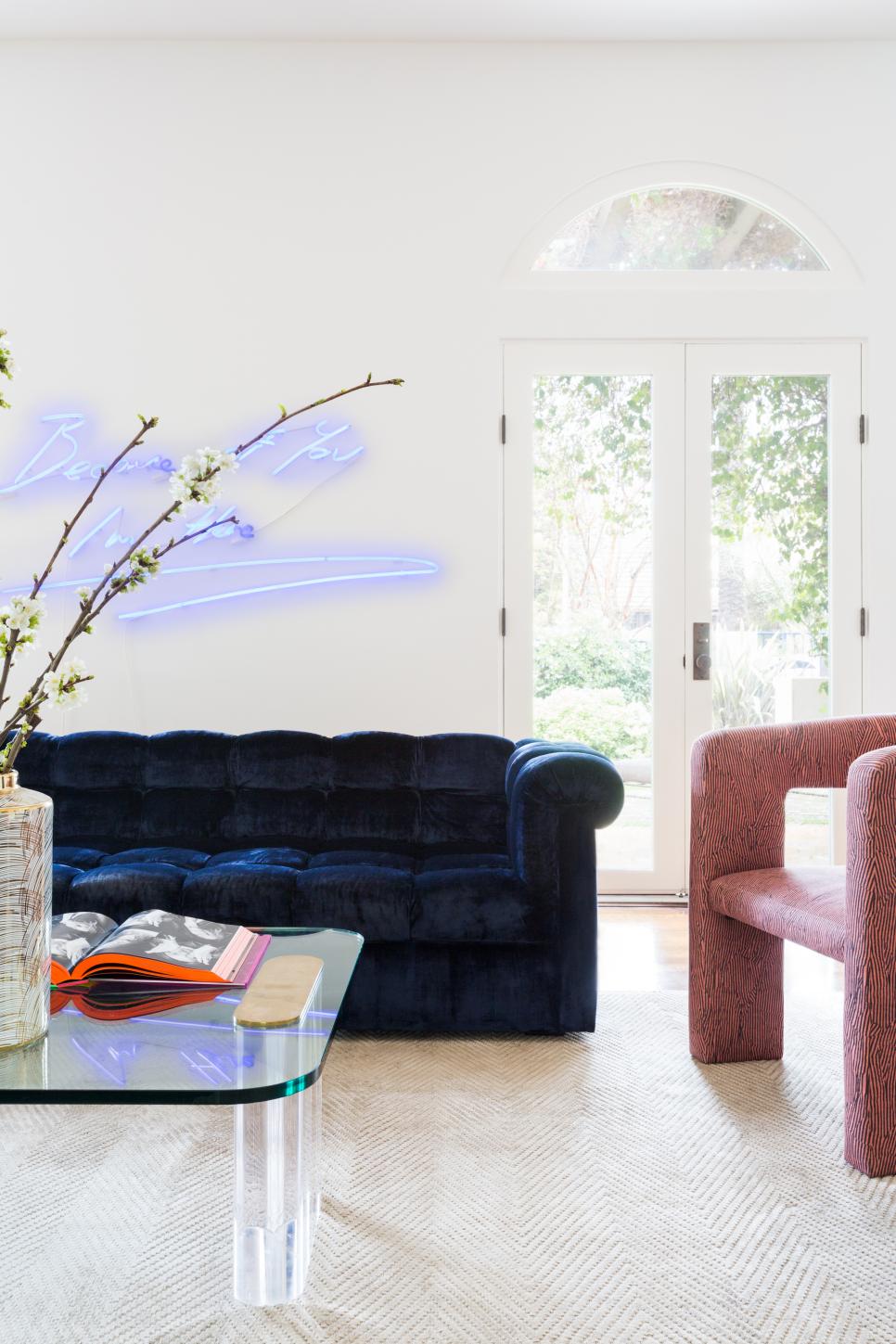 Modern Living Room With Contemporary Art Natural Light From The French Doors Enter The Large Modern Living Room
