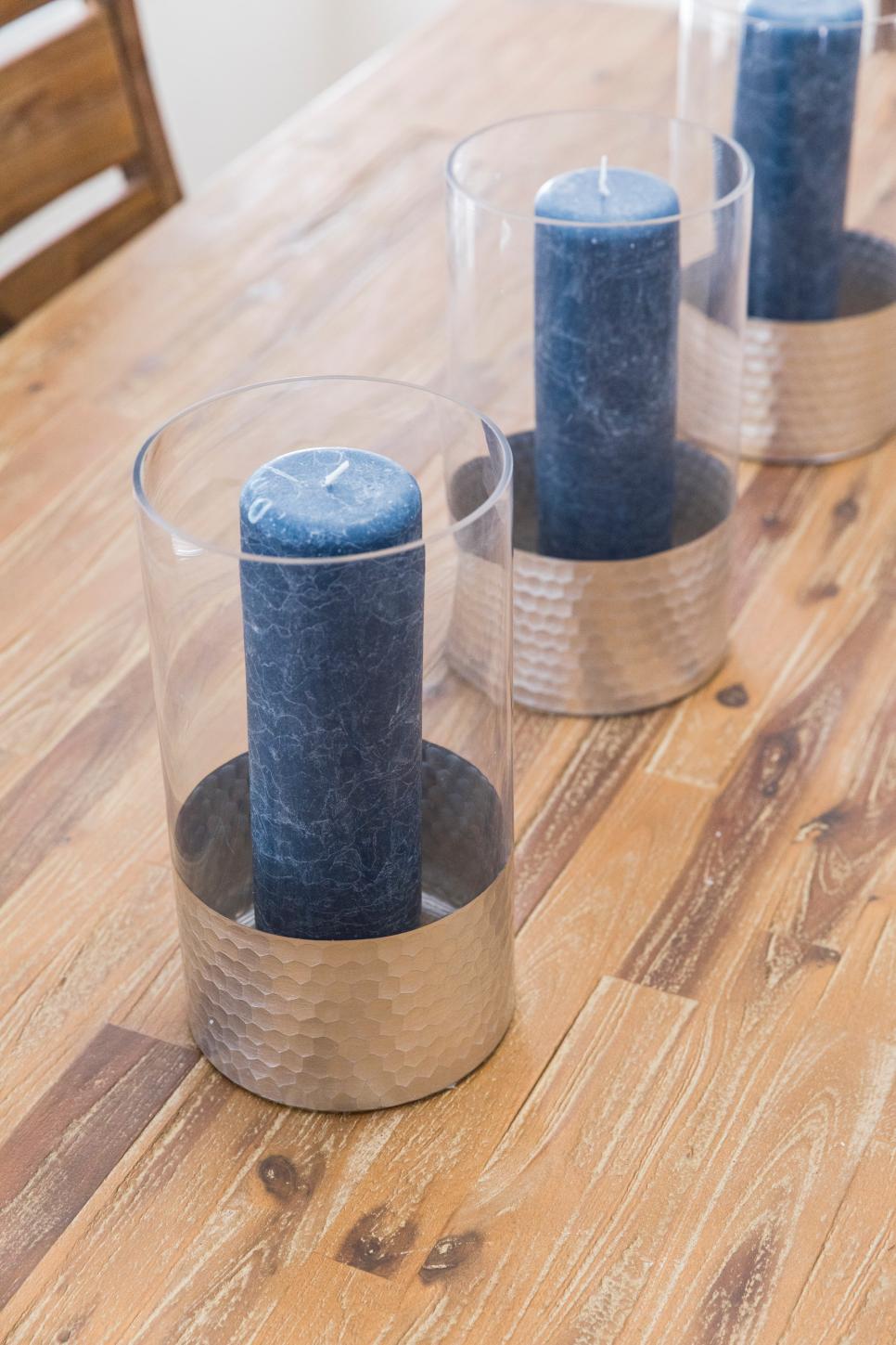Blue Candles in Contemporary Neutral Dining Room Blue Candles on a Neutral Wood Dining Table