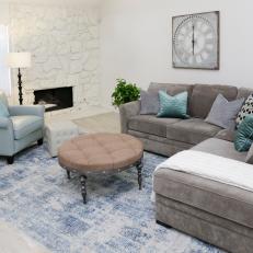 Contemporary White Living Room with Gray Sectional and Blue Armchair 