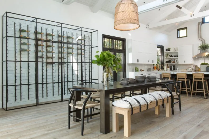 Neutral Dining Room with Large Black Wine Rack, Brown Table 