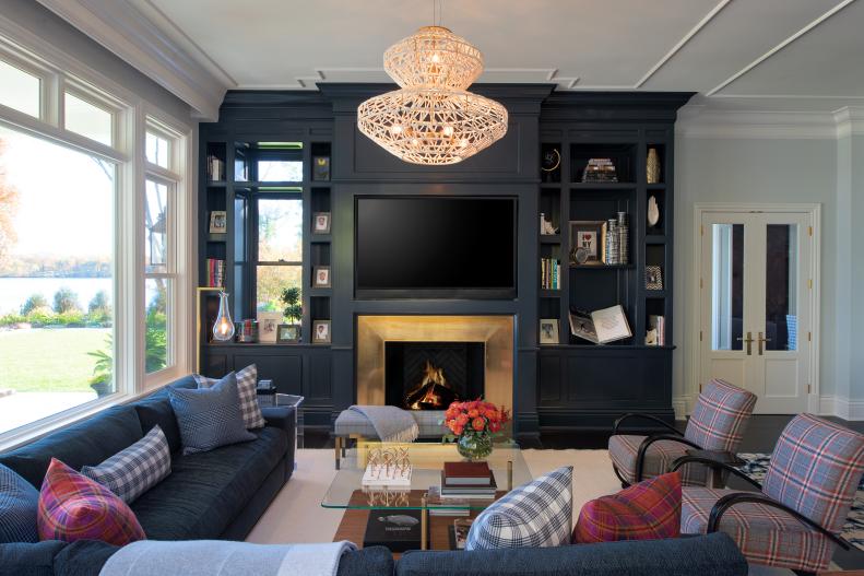 Living Room With Black Entertainment Center and Open-Weave Chandelier