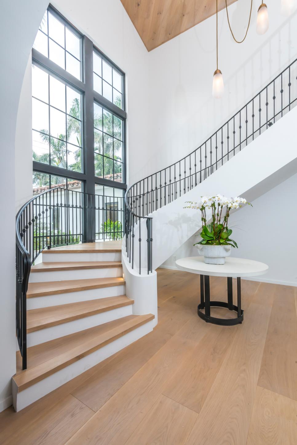 Light, Airy Entry Stairwell with Modern Railing