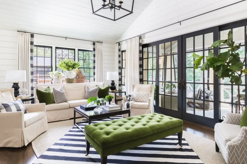 Living Room with Shiplap Walls and Black and White Striped Rug