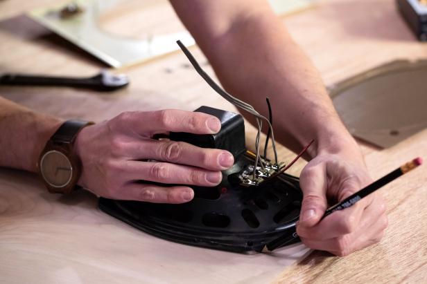 Host Dylan Eastman works on the Bluetooth Speaker project,as seen on Sunshine Upcycle