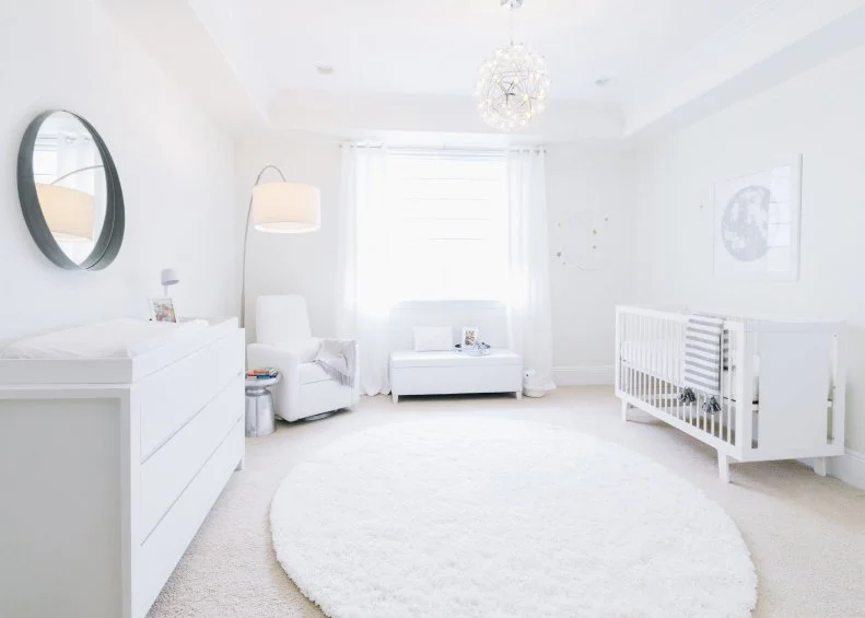 White Nursery With Chandelier