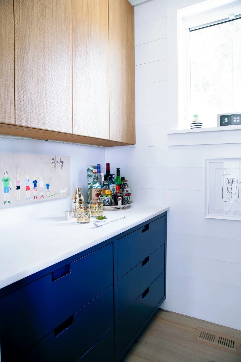 A pantry off of the kitchen is the perfect place for meal prep, a small bar area and extra storage.